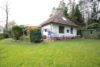 Titelbild - Ahausen: Wohnen im kleinen Bungalow mit Doppelcarport - auf einem großen Grundstück