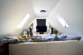 Wohnzimmer - Charmante 2-Zimmer-Dachgeschosswohnung in zentraler Lage