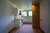 Gemütliche Dachgeschosswohnung mit brandneuer Einbauküche - Moderne Einbauküche