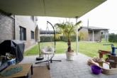 überdachte Terrasse - Stilvolle 4-Zimmer-Erdgeschosswohnung mit Terrasse & Carport