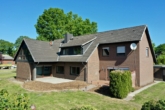 Hausansicht Garten - Vielseitiges Zweifamilienhaus mit Einliegerwohnung