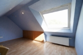 Spitzboden mit Stauraum - Vielseitiges Zweifamilienhaus mit Einliegerwohnung