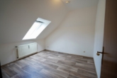 Schlafzimmer - Gemütliches Wohnen in 1,5-Zimmer-Dachgeschosswohnung