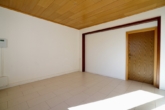 Wohnzimmer - Großzügige 4-Zimmer-Erdgeschosswohnung (ca. 120 m²) in Abbendorf