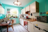 Einbauküche - Gemütliche 2-Zimmer-Erdgeschosswohnung mit zwei Terrassen in zentrumsnaher Lage