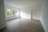 Wohn- und Esszimmer - 3-Zimmer Erdgeschosswohnung in begehrter Lage von Sittensen!