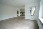 Wohn- und Esszimmer - 3-Zimmer Erdgeschosswohnung in begehrter Lage von Sittensen!