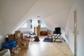 Wohnzimmer - Attraktive 2-Zimmer-Dachgeschosswohnung in zentrumsnaher Lage von Scheeßel