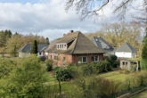 Hausansicht - 3-Zimmer-Erdgeschosswohnung in gepflegtem Mehrfamilienhaus