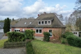 Hausansicht - 3-Zimmer-Erdgeschosswohnung in gepflegtem Mehrfamilienhaus