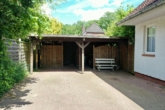 Carport mit Abstellraum - Doppelhaushälfte mit überdachter Terrasse im Grünen