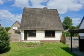 Hausansicht hinten - Einfamilienhaus mit Garage, Vollkeller und großem Garten in ruhiger Lage!