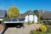 Hausansicht - Exklusives Zweifamilienhaus auf großem Grundstück mit Pool in Mulmshorn
