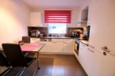 Rotenburg: Neuwertige Obergeschosswohnung in begehrter Lage - Einbauküche mit Sitzmöglichkeit
