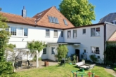 Garten mit Terrasse - Charmantes Wohn- und Geschäftshaus mit historischem Flair in zentraler Lage