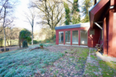 Wintergarten - Wohnen am Waldrand – Holzhaus mit Wintergarten, Kamin und Naturgrundstück