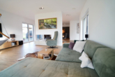 Wohnzimmer mit Bioethanol-Kamin - Designvilla mit möglicher Einliegerwohnung, moderner Technik und top Ausstattung