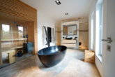 Badezimmer mit Sauna - Designvilla mit möglicher Einliegerwohnung, moderner Technik und top Ausstattung